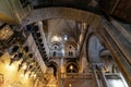 Church of the Holy Sepulchre interior, main entrance hall with cloisters of Calvary or Golgotha Chapel in Christian Quarter of Royalty Free Stock Photo