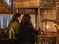 Believers light candles in a specially designed place in the main hall of the Church of Nativity in Bethlehem in Palestine Royalty Free Stock Photo