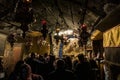 A group of believers holds a joint prayer in the Christmas Cave in the Church of Nativity in Bethlehem in Palestine Royalty Free Stock Photo