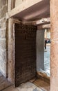 Iron-bound church side door to the Church of Nativity in Bethlehem in Palestine