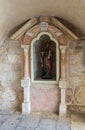 The statue of Elias the prophet stands in a niche at the entrance to the grotto of the Milk Grotto Church in Bethlehem in