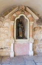 The statue of King David stands in a niche at the entrance to the grotto of the Milk Grotto Church in Bethlehem in Palestine