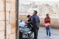 Two Palestinian traffic police officers issue a parking ticket near to the Church of Nativity in Bethlehem in Palestine