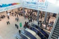 Exterior glass lobby of the new underground railway station in Jerusalem People ride the