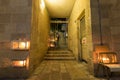 Hanukkah candles are lit at the entrance to old houses in the Jewish Quarter