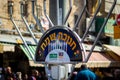 A huge metal menorah placed at the entrance to the Mahane Yehuda market