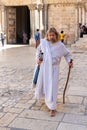 A man posing as Jesus Christ walks across the square in front of the Church of the Holy Sepulcher in the old city of Jerusalem, Royalty Free Stock Photo