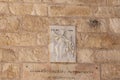 Stone bas-relief depicting St. Catherine above the entrance to the Greek Church Saint Catherine in Jerusalem in Christian quarters