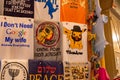 T-shirts with different designs for sale at the gift shop in the old Arab market in the old city of Jerusalem, Israel Royalty Free Stock Photo