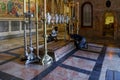 Believer men kneel and pray in the Church of the Holy Sepulchre in Christian quarter in the old city of Jerusalem, Israel