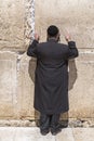 Jewish people praying against the Western Wall in Jerusalem Royalty Free Stock Photo