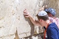 Jewish people praying against the Western Wall in Jerusalem Royalty Free Stock Photo