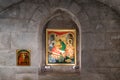 Icons hang on the wall in the prayer room in the cave in the Church of Saint Anne near Pools of Bethesda in the old city of Jerusa