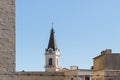 The tower of the St. Saviors Convent with clock over the old city of Jerusalem, Israel