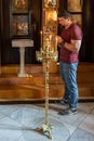 Gilded standing candle in the interior of Church of Mary Magdalene in Jerusalem, Israel