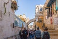 Numerous tourists walk along Via Dolorosa in old city of Jerusalem, Israel