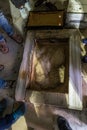 Stone with the footprint of the Foot of Christ surrounded by a marble frame in Chapel of the Ascension on Mount Eleon - Mount of