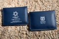 Jerusalem, ISRAEL - November 26, 2019.Temporary Israeli passports lying on the ancient stones in old Jerusalem Royalty Free Stock Photo