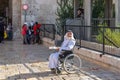 An elderly Muslim Arab sits near the Damascus Gate and begs for alms in the Muslim part of the old city of Jerusalem, Israel