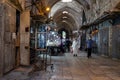 Few shoppers shop at the few open small shops on Suq El Qatanin Street in the Muslim part of the old city of Jerusalem, Israel