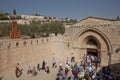 People entering Church of the Sepulchre of Saint Mary, known as Tomb of Virgin Mary, sanctuary at Mount of Olives in Kidron river Royalty Free Stock Photo