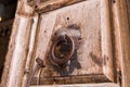 Antique metal handle on a wooden entrance door to the Church of the Holy Sepulchre in the Old City in Jerusalem, Israel