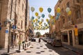 Jerusalem, Israel - September 22, 2023: Colorful balloons hanging over a Jerusalem street