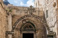 Decorative metal cross mounted on a metal arch near Coptic Orthodox Patriarchate in the Old City in Jerusalem, Israel Royalty Free Stock Photo