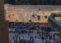 Numerous believers are in the evening near the Western Wall in the old city of Jerusalem for a holiday prayer dedicated to the hol Royalty Free Stock Photo