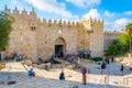 JERUSALEM, ISRAEL, SEPTEMBER 7, 2018: People are passing through Damascus gate in Jerusalem, Israel