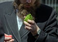 Jew with beard chooses a etrog
