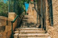 Jerusalem Israeli ancient city back street stairway passage between old stone buildings Middle East travel destination for a lot Royalty Free Stock Photo