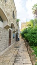 Jerusalem stone house on narrow street of Old Yafo Jaffa. Tel Aviv, Israel.