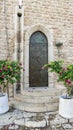 Jerusalem white stone house on narrow street of Old Yafo Jaffa. Tel Aviv, Israel.