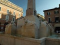 JESI, ITALY - MAY 17, 2022: Beautiful fountain of stone lions around obelisk on spring day