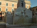 JESI, ITALY - MAY 17, 2022: Beautiful fountain of stone lions around obelisk on spring day