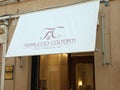 JESI, ITALY - MAY 17, 2022: Entrance of home decor store with canopy on city street