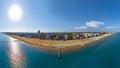 Jesolo in a aerialial panoramic view on blue sea - golden beach and sea with back city