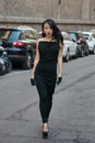 Jessica Wang with black dress and half gloves before Sportmax fashion show, Milan Fashion Week