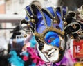 jester mask with rattles for sale in Venetian stall Royalty Free Stock Photo