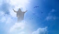 Jesus appeared bright in the sky and Christian Cross with soft fluffy clouds, white and beautiful with the light shining as hope, Royalty Free Stock Photo