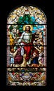 Jesus blesses mothers with children, stained glass window in the Saint John the Baptist church in Zagreb