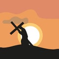 Jesus carrying the cross on his shoulders at sunset Royalty Free Stock Photo