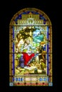 Jesus with the children, stained glass window Church of Sainte-Famille Cap-Sante, Quebec Royalty Free Stock Photo