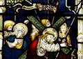 Jesus Christ carrying the cross in stained glass