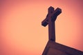 Jesus Christ cross. The Crucifixion, Resurrection and Easter concept. The Christian cross with a sunset scene in warm tone Royalty Free Stock Photo