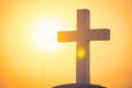 Jesus Christ cross. The Crucifixion, Resurrection and Easter concept. The Christian cross with a sunset scene in warm tone Royalty Free Stock Photo