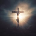 Jesus Christ on the cross in the dark forest with rays of light Royalty Free Stock Photo