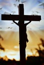 Jesus Christ cross over sunset sky Royalty Free Stock Photo