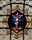 Jesus Christ on the cross, stained glass window in the Saint Sulpice Church, Paris Royalty Free Stock Photo